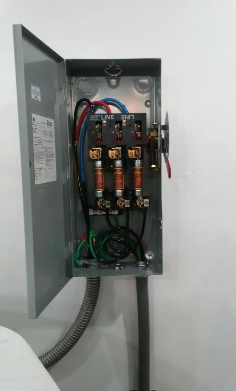 Three-phase disconnect switch installed for Smoke Detector Installation in Willard